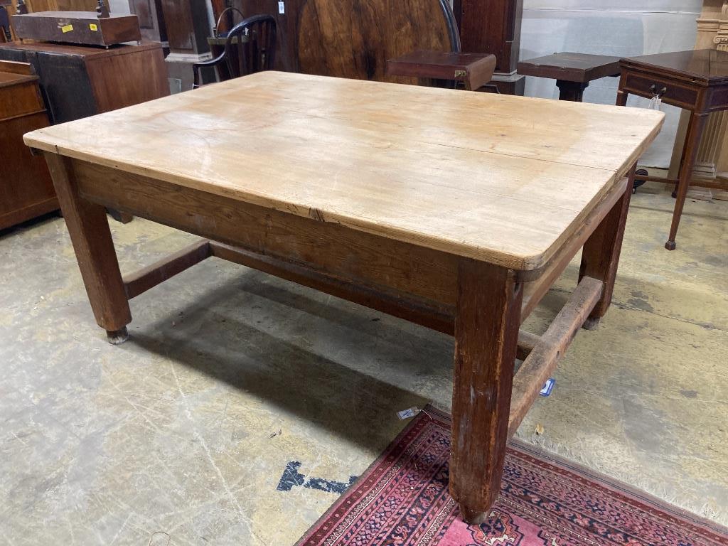 A large Victorian pine kitchen table